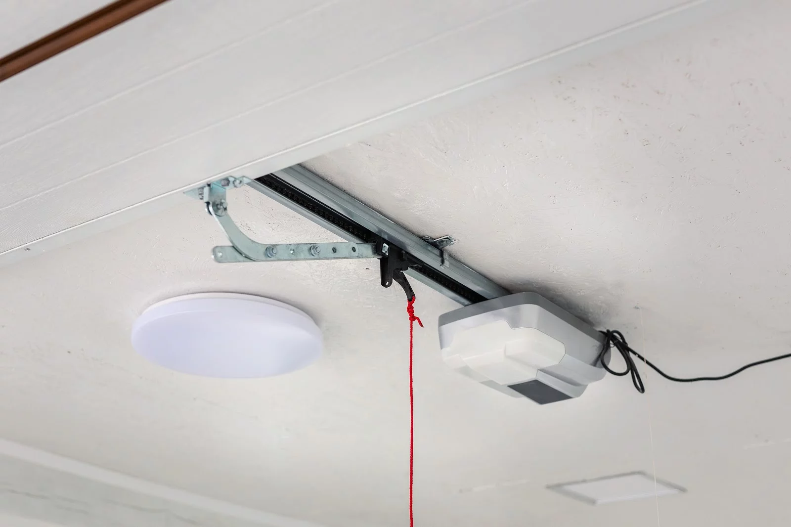 Automatic garage door opener operating during residential garage door installation planning in Long Beach CA
