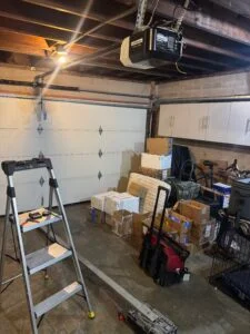 Garage door repair technician checking cable tension, drum alignment, and spring balance in Long Beach CA